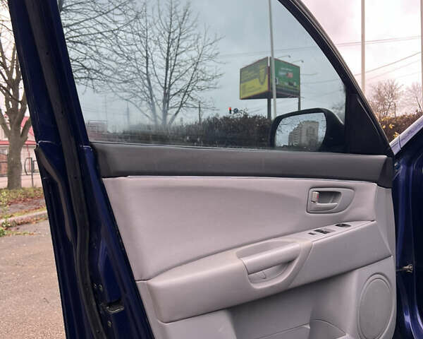 Синій Мазда 3, об'ємом двигуна 1.6 л та пробігом 228 тис. км за 4350 $, фото 11 на Automoto.ua