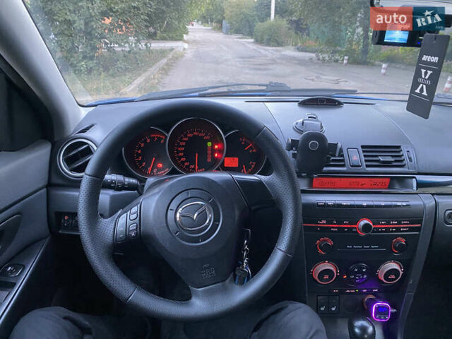 Синій Мазда 3, об'ємом двигуна 1.6 л та пробігом 192 тис. км за 6000 $, фото 17 на Automoto.ua