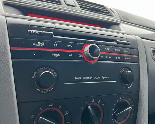 Синій Мазда 3, об'ємом двигуна 1.6 л та пробігом 228 тис. км за 4350 $, фото 24 на Automoto.ua