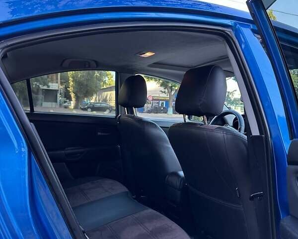 Синій Мазда 3, об'ємом двигуна 1.6 л та пробігом 184 тис. км за 5700 $, фото 7 на Automoto.ua