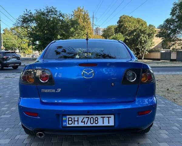 Синій Мазда 3, об'ємом двигуна 1.6 л та пробігом 184 тис. км за 5700 $, фото 4 на Automoto.ua