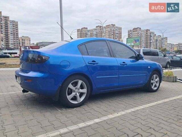 Синий Мазда 3, объемом двигателя 1.6 л и пробегом 185 тыс. км за 6000 $, фото 4 на Automoto.ua