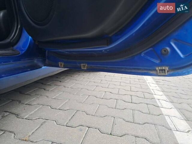 Синий Мазда 3, объемом двигателя 1.6 л и пробегом 185 тыс. км за 6000 $, фото 17 на Automoto.ua