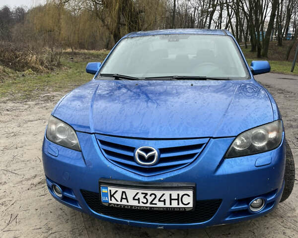 Синий Мазда 3, объемом двигателя 2 л и пробегом 200 тыс. км за 3900 $, фото 3 на Automoto.ua