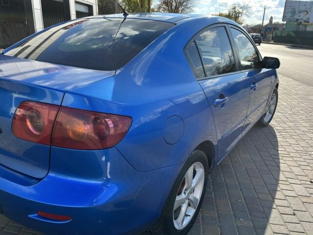 Синій Мазда 3, об'ємом двигуна 1.6 л та пробігом 285 тис. км за 4190 $, фото 7 на Automoto.ua