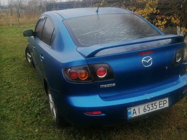 Синій Мазда 3, об'ємом двигуна 1.6 л та пробігом 200 тис. км за 2800 $, фото 4 на Automoto.ua