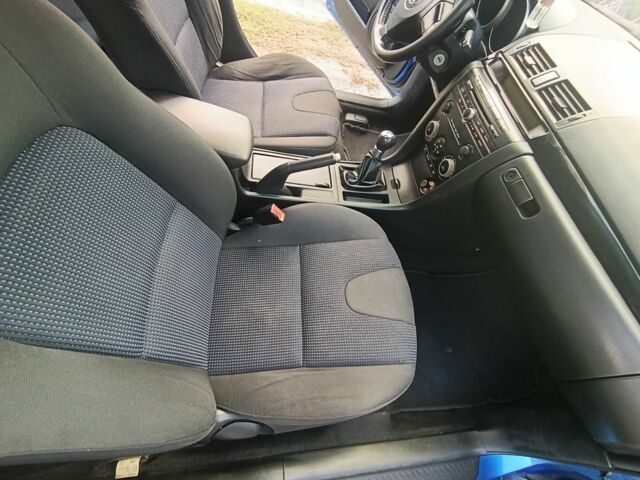 Синий Мазда 3, объемом двигателя 1.6 л и пробегом 350 тыс. км за 3410 $, фото 6 на Automoto.ua