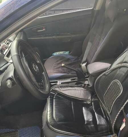Синий Мазда 3, объемом двигателя 1.56 л и пробегом 270 тыс. км за 4700 $, фото 4 на Automoto.ua