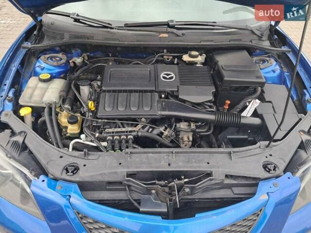Синий Мазда 3, объемом двигателя 1.6 л и пробегом 185 тыс. км за 6000 $, фото 20 на Automoto.ua