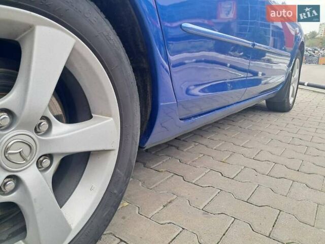 Синий Мазда 3, объемом двигателя 1.6 л и пробегом 185 тыс. км за 6000 $, фото 18 на Automoto.ua