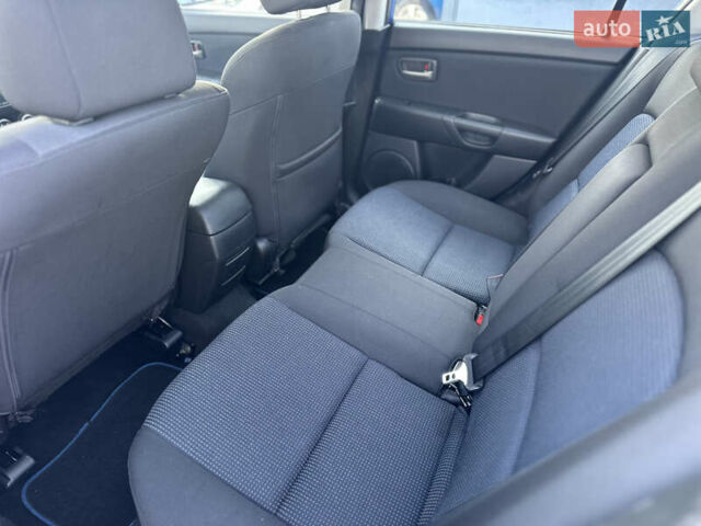 Синий Мазда 3, объемом двигателя 1.6 л и пробегом 205 тыс. км за 4450 $, фото 7 на Automoto.ua