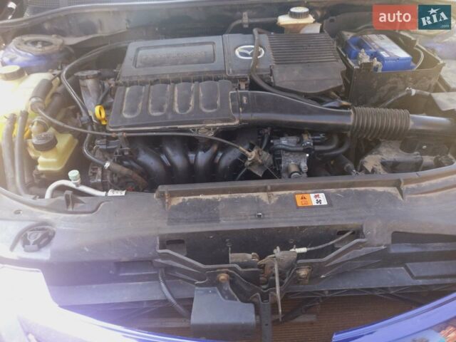 Синий Мазда 3, объемом двигателя 1.6 л и пробегом 192 тыс. км за 4600 $, фото 1 на Automoto.ua