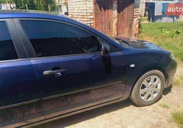 Синій Мазда 3, об'ємом двигуна 1.6 л та пробігом 192 тис. км за 4600 $, фото 9 на Automoto.ua