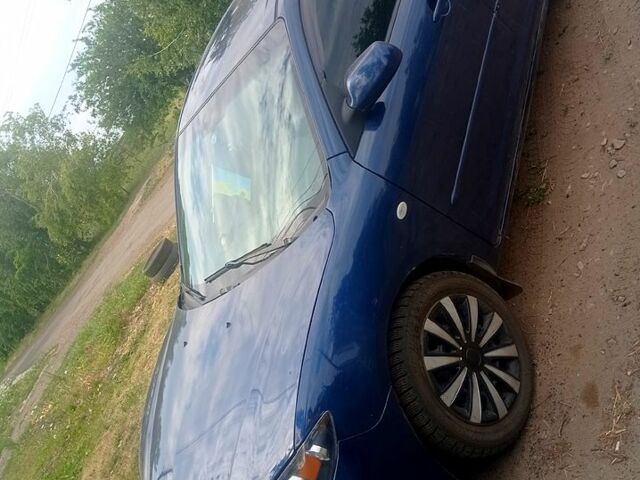 Синий Мазда 3, объемом двигателя 2 л и пробегом 255 тыс. км за 3200 $, фото 2 на Automoto.ua