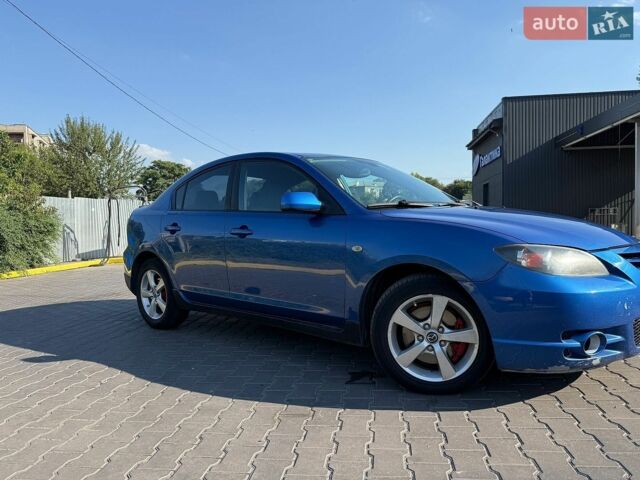 Синий Мазда 3, объемом двигателя 2 л и пробегом 290 тыс. км за 6000 $, фото 4 на Automoto.ua