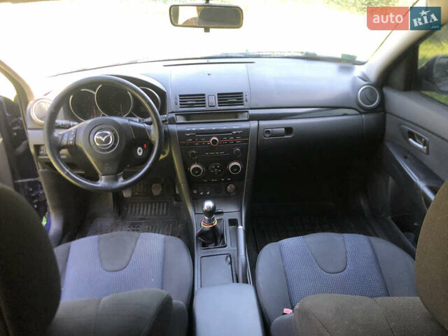 Синий Мазда 3, объемом двигателя 1.6 л и пробегом 175 тыс. км за 3500 $, фото 6 на Automoto.ua