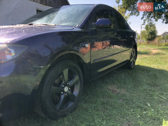 Синий Мазда 3, объемом двигателя 1.6 л и пробегом 175 тыс. км за 3500 $, фото 3 на Automoto.ua