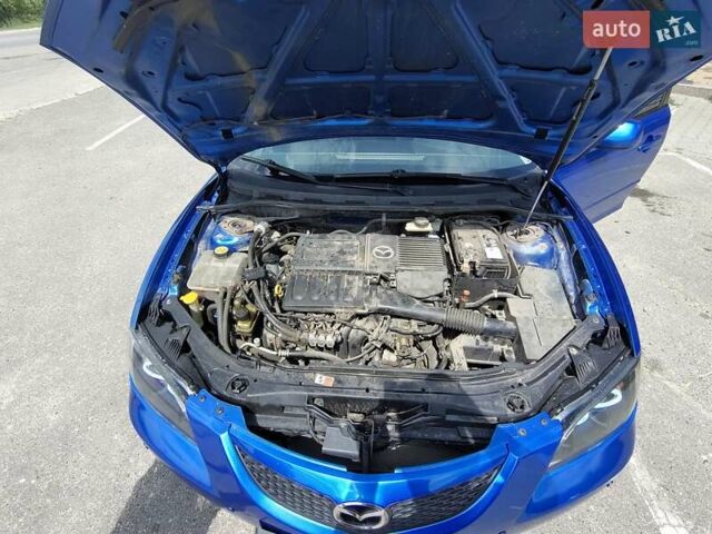 Синий Мазда 3, объемом двигателя 1.6 л и пробегом 253 тыс. км за 5500 $, фото 12 на Automoto.ua