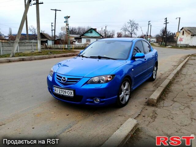 Синій Мазда 3, об'ємом двигуна 2 л та пробігом 240 тис. км за 4200 $, фото 2 на Automoto.ua