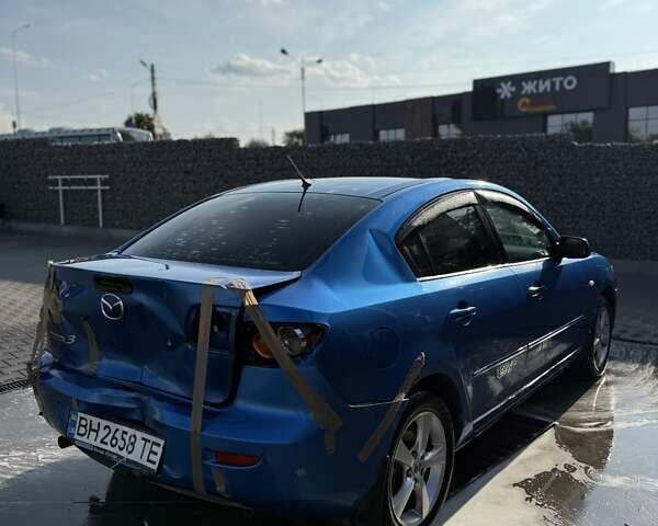 Синий Мазда 3, объемом двигателя 1.6 л и пробегом 198 тыс. км за 2800 $, фото 6 на Automoto.ua