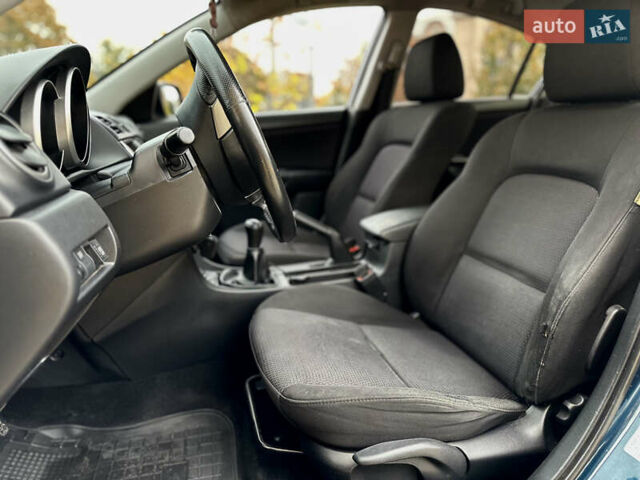 Синій Мазда 3, об'ємом двигуна 2 л та пробігом 268 тис. км за 5600 $, фото 11 на Automoto.ua