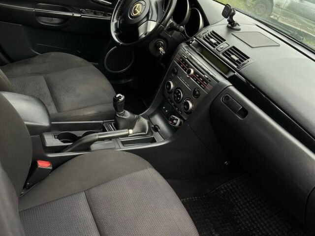 Синій Мазда 3, об'ємом двигуна 1 л та пробігом 4 тис. км за 3200 $, фото 7 на Automoto.ua