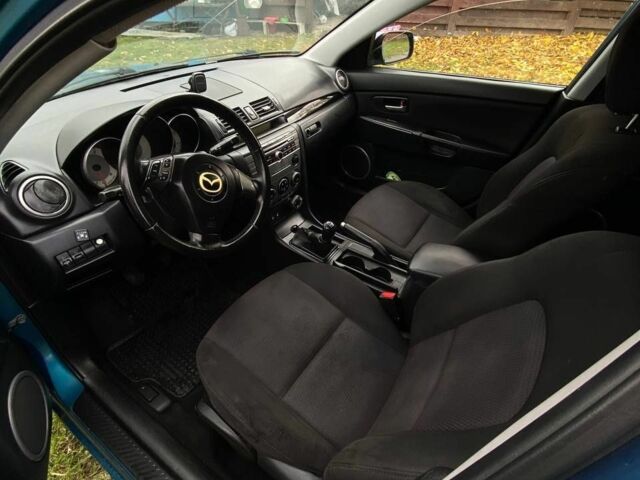 Синій Мазда 3, об'ємом двигуна 1 л та пробігом 4 тис. км за 3200 $, фото 6 на Automoto.ua