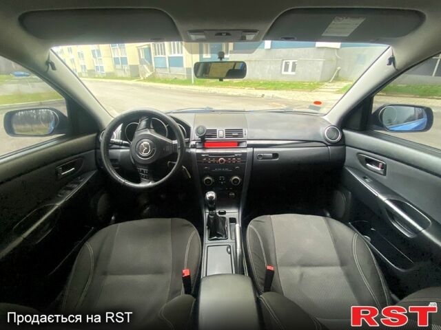 Синий Мазда 3, объемом двигателя 1.6 л и пробегом 255 тыс. км за 5200 $, фото 4 на Automoto.ua
