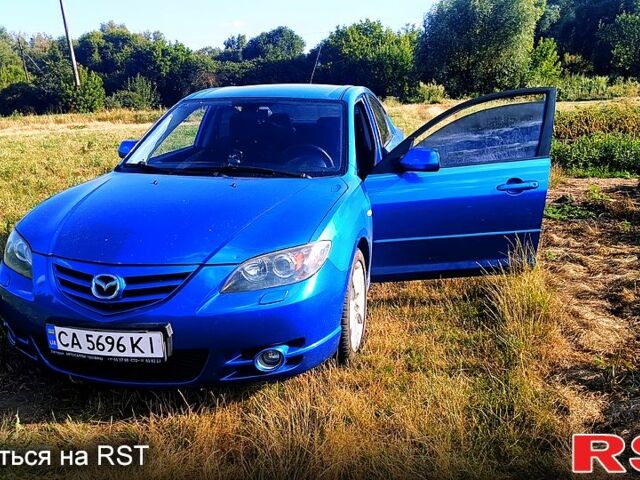 Синій Мазда 3, об'ємом двигуна 2 л та пробігом 240 тис. км за 4200 $, фото 6 на Automoto.ua
