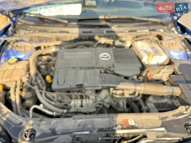 Синий Мазда 3, объемом двигателя 1.6 л и пробегом 198 тыс. км за 2800 $, фото 21 на Automoto.ua