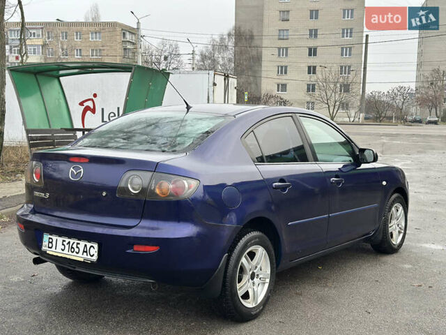 Синій Мазда 3, об'ємом двигуна 1.6 л та пробігом 180 тис. км за 5500 $, фото 4 на Automoto.ua