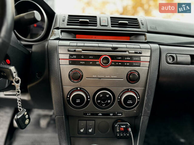 Синій Мазда 3, об'ємом двигуна 2 л та пробігом 268 тис. км за 5600 $, фото 10 на Automoto.ua