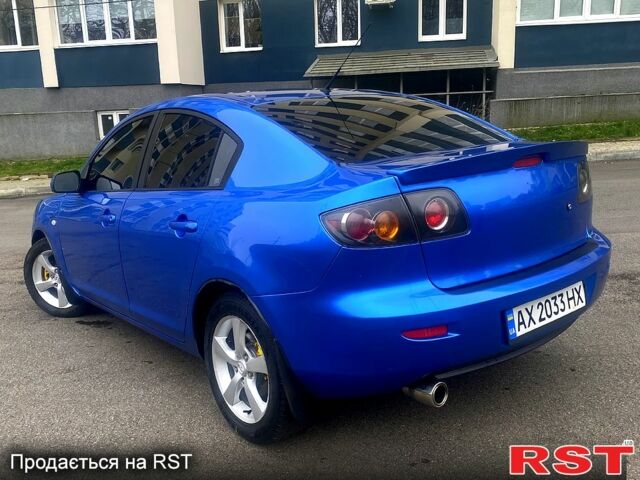 Синий Мазда 3, объемом двигателя 1.6 л и пробегом 255 тыс. км за 5200 $, фото 2 на Automoto.ua