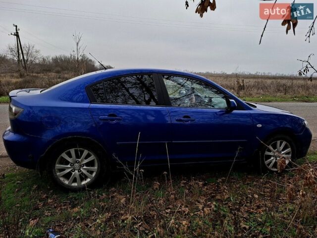 Синий Мазда 3, объемом двигателя 1.6 л и пробегом 289 тыс. км за 3500 $, фото 6 на Automoto.ua