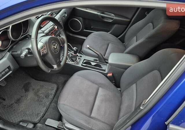 Синій Мазда 3, об'ємом двигуна 1.6 л та пробігом 162 тис. км за 5499 $, фото 9 на Automoto.ua