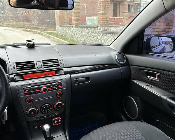 Синий Мазда 3, объемом двигателя 1.6 л и пробегом 223 тыс. км за 5000 $, фото 18 на Automoto.ua