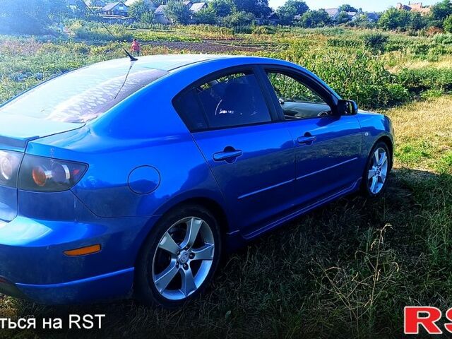Синій Мазда 3, об'ємом двигуна 2 л та пробігом 240 тис. км за 4200 $, фото 3 на Automoto.ua