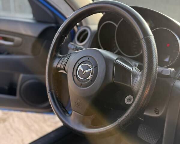 Синий Мазда 3, объемом двигателя 1.6 л и пробегом 198 тыс. км за 2800 $, фото 18 на Automoto.ua