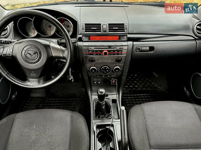 Синій Мазда 3, об'ємом двигуна 2 л та пробігом 268 тис. км за 5600 $, фото 7 на Automoto.ua