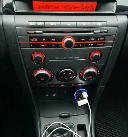 Синій Мазда 3, об'ємом двигуна 1.6 л та пробігом 162 тис. км за 5499 $, фото 10 на Automoto.ua