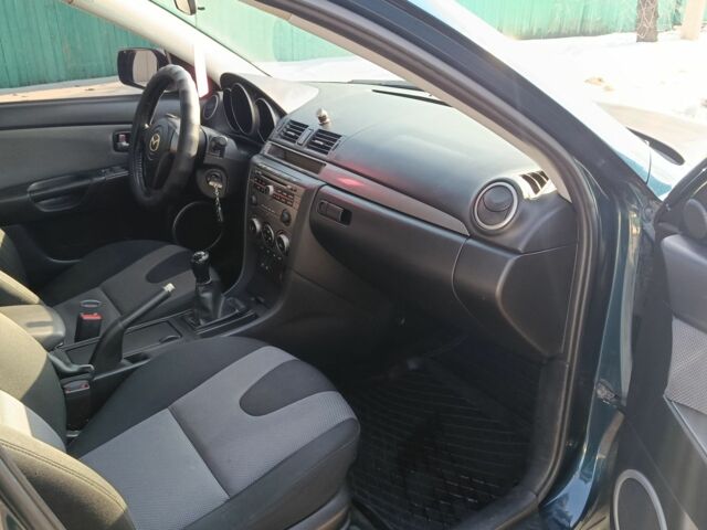 Синий Мазда 3, объемом двигателя 2 л и пробегом 250 тыс. км за 3250 $, фото 18 на Automoto.ua