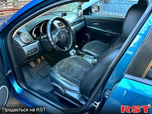 Синий Мазда 3, объемом двигателя 2 л и пробегом 247 тыс. км за 4300 $, фото 7 на Automoto.ua