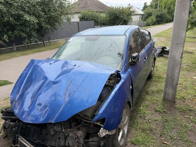 Синій Мазда 3, об'ємом двигуна 1.6 л та пробігом 190 тис. км за 601 $, фото 6 на Automoto.ua