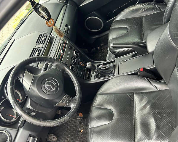 Синій Мазда 3, об'ємом двигуна 2 л та пробігом 170 тис. км за 5000 $, фото 2 на Automoto.ua