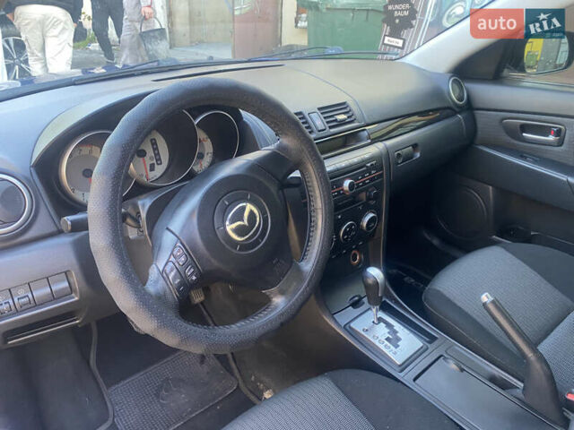 Синий Мазда 3, объемом двигателя 1.6 л и пробегом 197 тыс. км за 5500 $, фото 9 на Automoto.ua