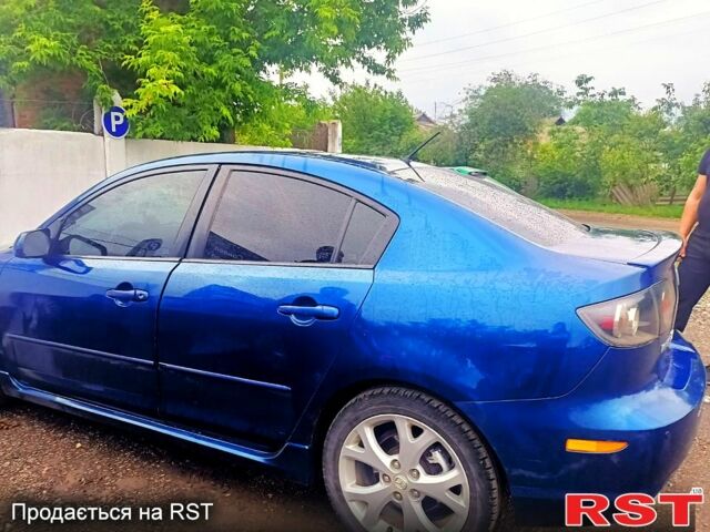 Синий Мазда 3, объемом двигателя 2 л и пробегом 258 тыс. км за 4500 $, фото 3 на Automoto.ua