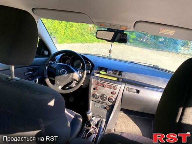 Синий Мазда 3, объемом двигателя 1.6 л и пробегом 237 тыс. км за 5300 $, фото 7 на Automoto.ua