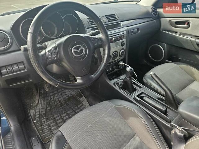 Синій Мазда 3, об'ємом двигуна 2 л та пробігом 301 тис. км за 5700 $, фото 12 на Automoto.ua