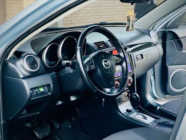 Синий Мазда 3, объемом двигателя 1.6 л и пробегом 196 тыс. км за 4500 $, фото 15 на Automoto.ua