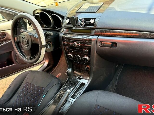 Мазда 3 2007 у Первомайськ на Automoto.ua Синій Мазда 3, об'ємом двигуна 1.6 л та пробігом 247 тис. км за 5000 $, фото 12 на Automoto.ua